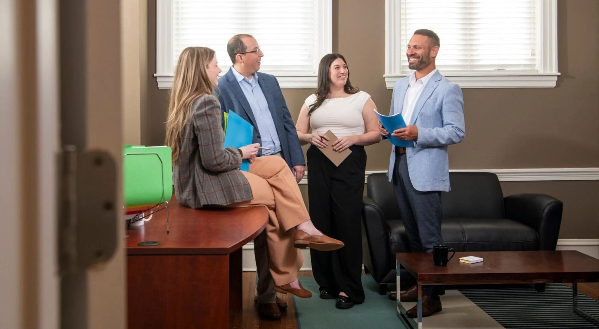 Advisor and small-business owner planning benefits together